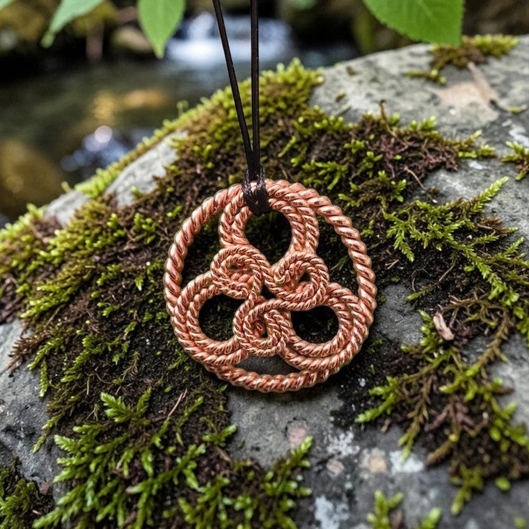 Handmade copper triskelion pendant with 432MHz and 177MHz tuning, a triple spiral in twisted wire