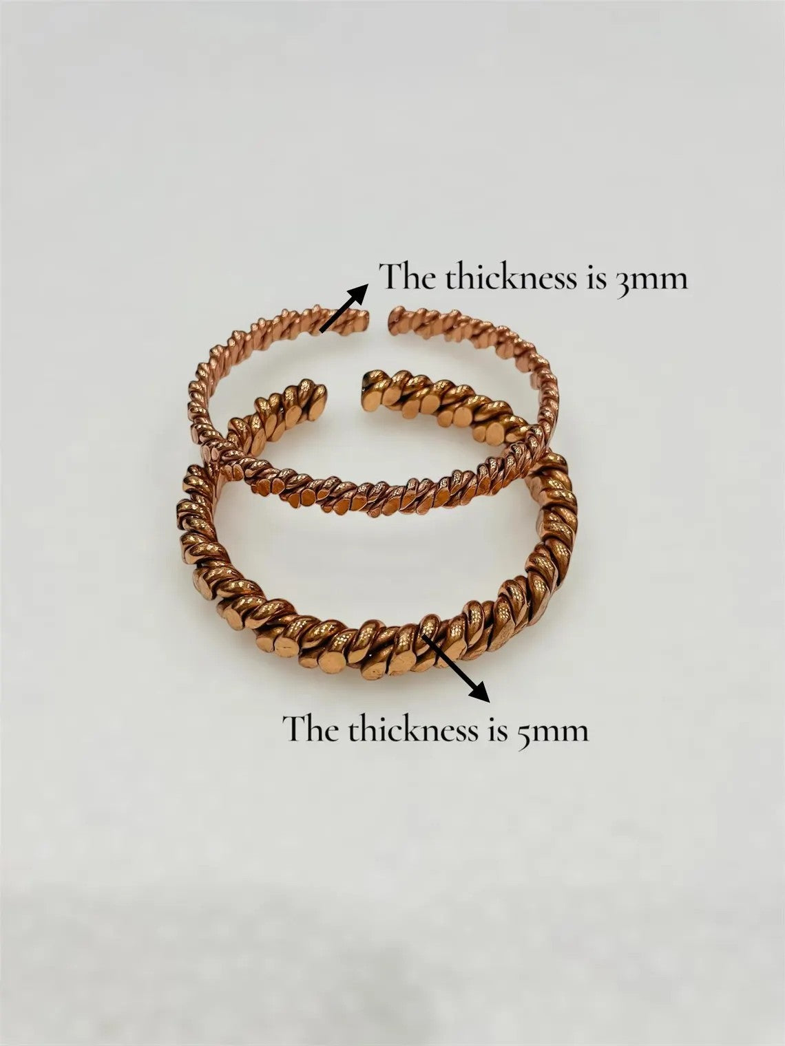 abusta.viking vòng sạc nước bằng đồng nguyên chất, có hai kích cỡ 3mm và 5mm, thiết kế xoắn độc đáo.