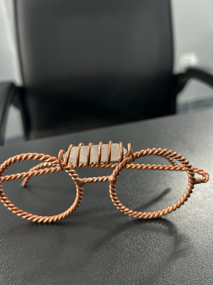 Handmade twisted copper tensor glasses with clear quartz crystal point