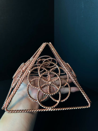 Angled view of copper merkaba showing its full 3D star form