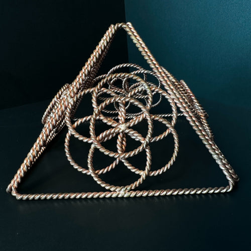 Handmade copper merkaba star tetrahedron with Flower of Life core