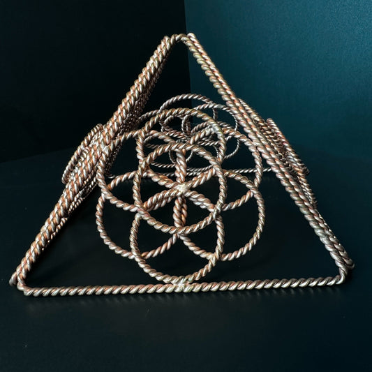 Handmade copper merkaba star tetrahedron with Flower of Life core