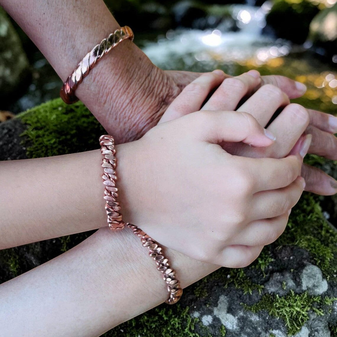 Side profile of a handmade solid copper rope cuff bracelet