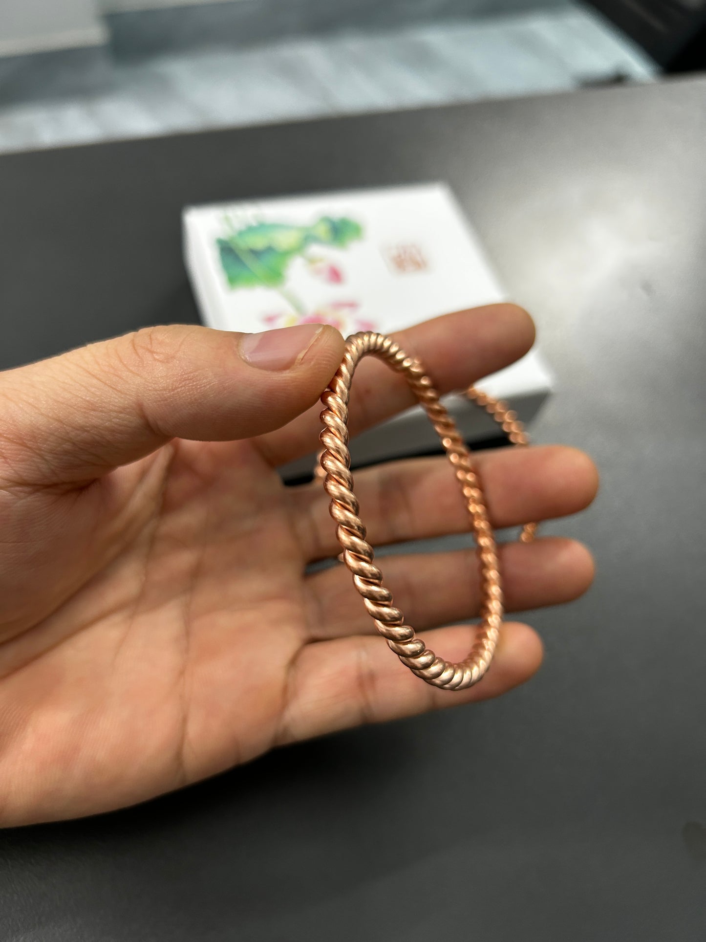 Copper twisted rope bangle on lotus gift box, handmade pure copper bracelet ready to gift.