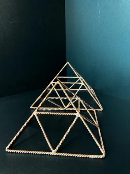 Two reinforced copper pyramids top view, sacred geometry crystal charging set