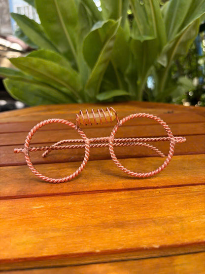 Yellow aventurine point coil-set on copper tensor glasses bridge